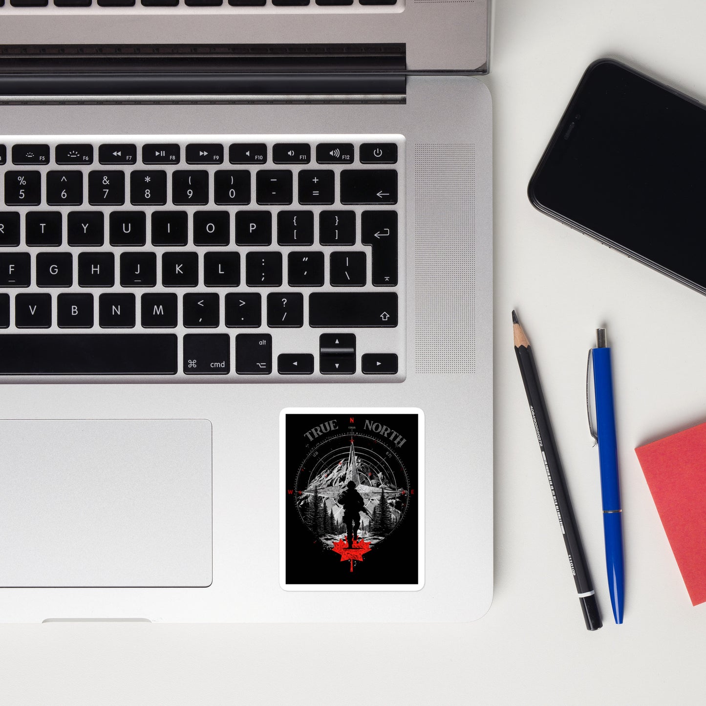 True North vinyl sticker featuring soldier silhouette, mountain and compass design, and embedded maple leaf — Canadian patriotic decal by Tactical Motive.